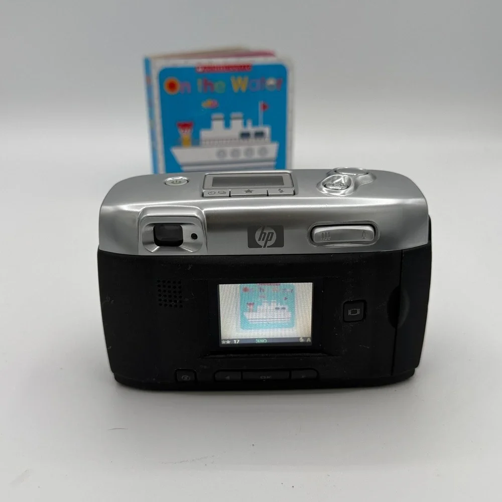 HP Photosmart 720 Digital Camera 3.3MP 3x Optical Zoom Silver Black Q2164A